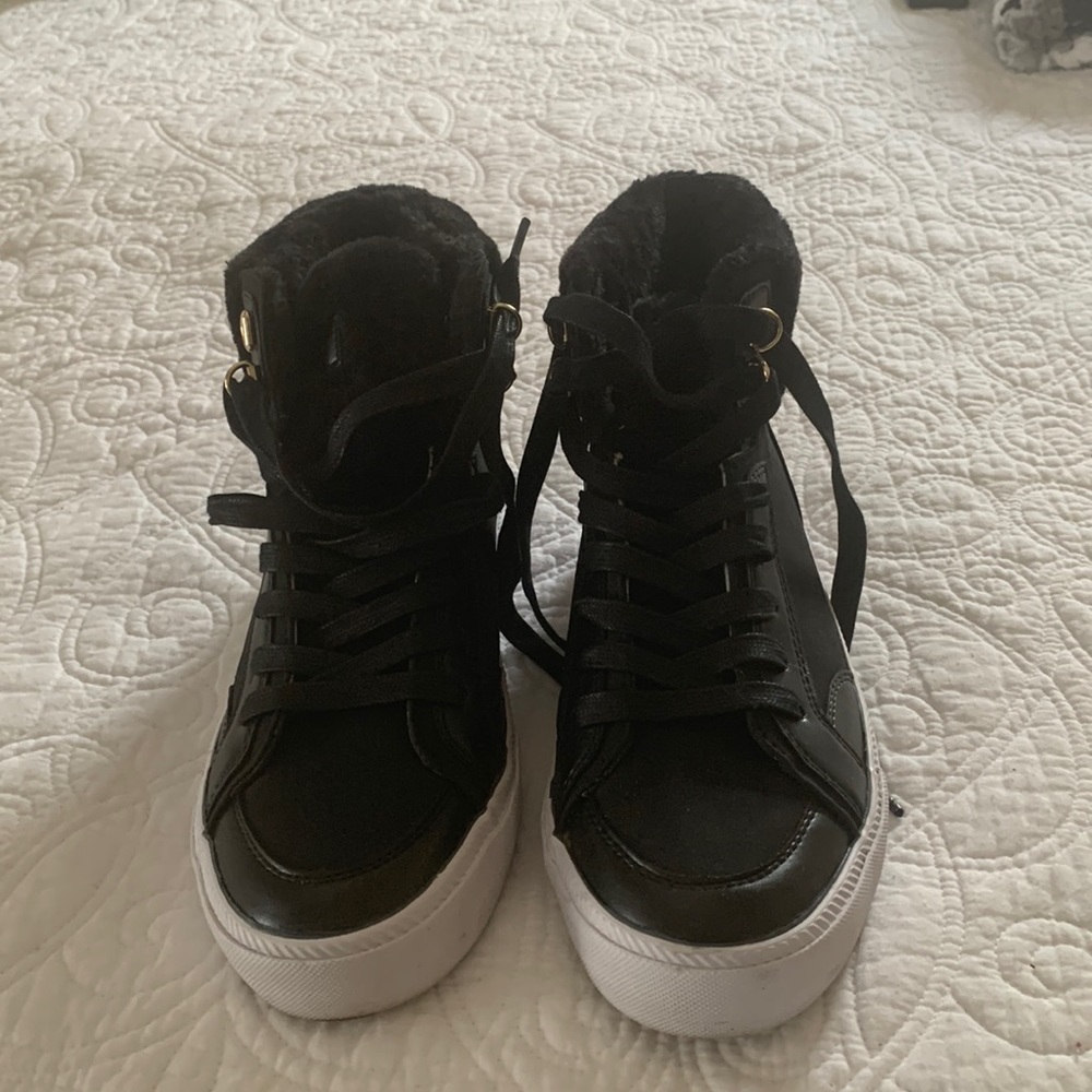 Black high top sneakers